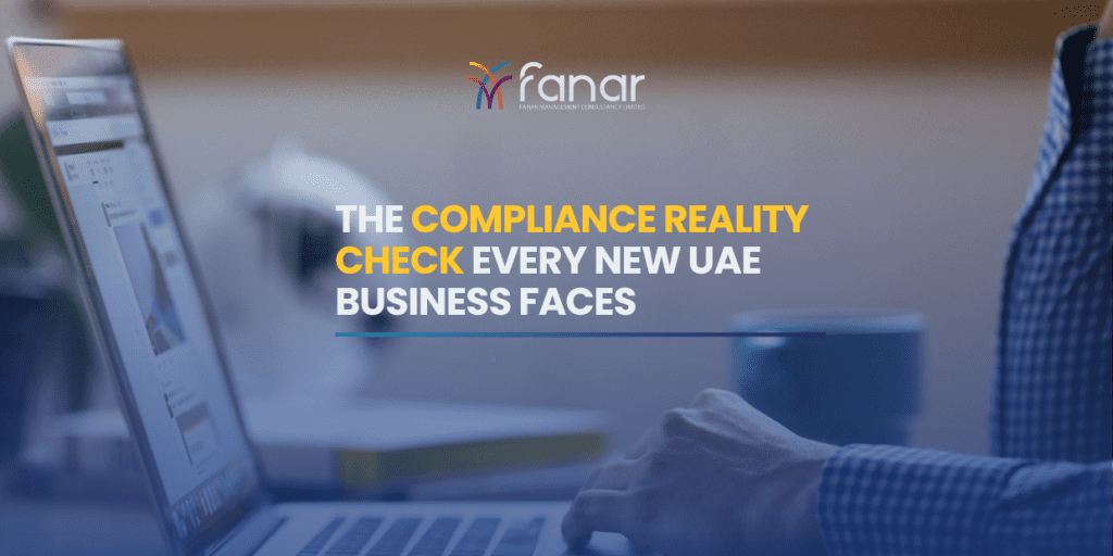 Business professional working on a laptop with the headline “The Compliance Reality Check Every New UAE Business Faces” for a UAE business compliance advisory blog by Fanar.
