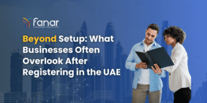 Fanar Advisor blog banner showing two professionals reviewing documents against a Dubai skyline background with the title “Beyond Setup: What Businesses Often Overlook After Registering in the UAE.”